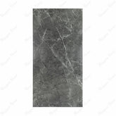 Atlanta Black porcelain slab flat view showing deep charcoal grey marble surface with bold white veining and natural marble movement for UAE interior design