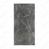 Atlanta Black porcelain slab flat view showing deep charcoal grey marble surface with bold white veining and natural marble movement for UAE interior design