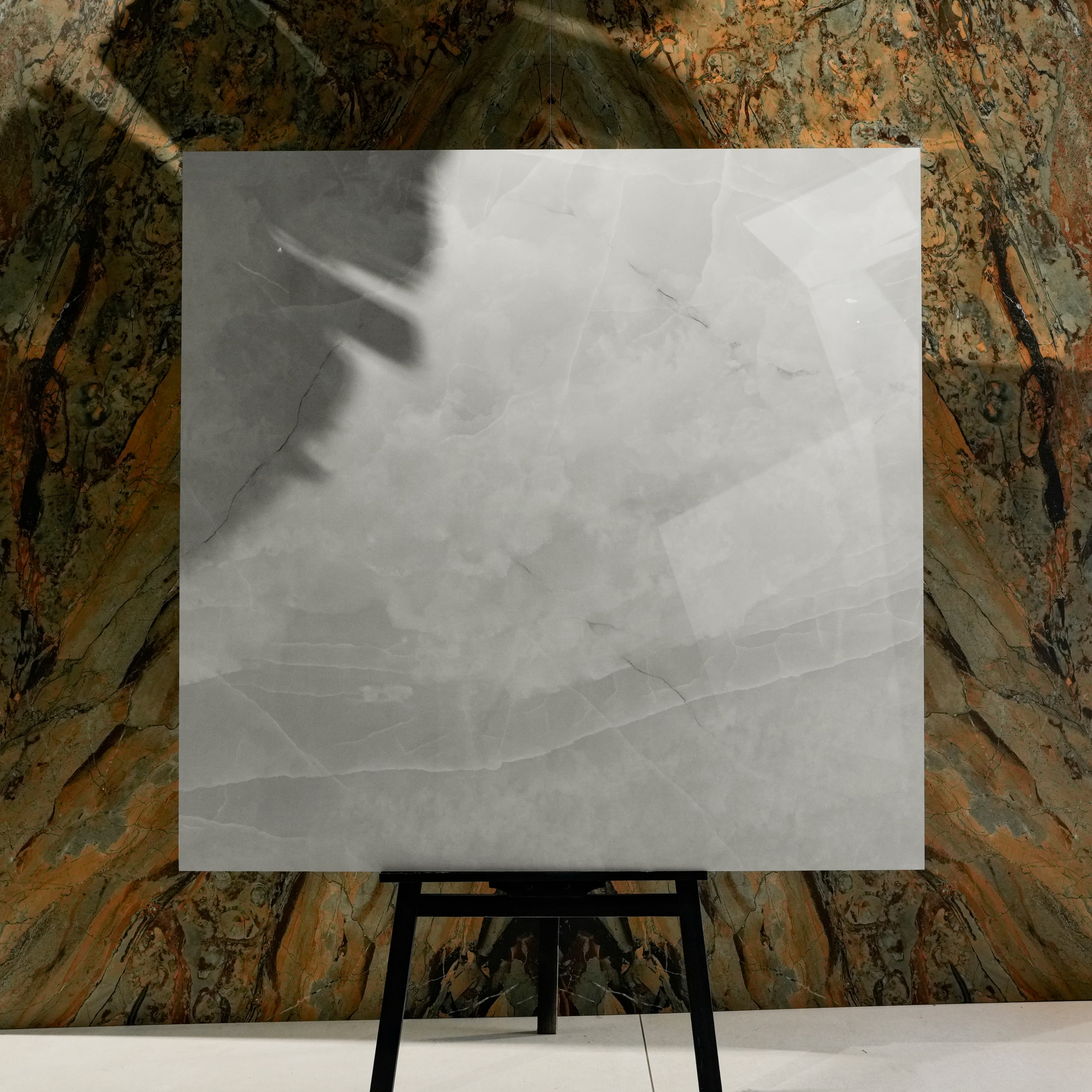 Onyx Lural 120x120cm glossy porcelain tile flat view showing soft white-grey onyx surface with crystalline cloud-like movement
