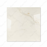 Cecelia Gold glossy porcelain tile 120x120cm displayed on easel against luxury marble backdrop for UAE interior design