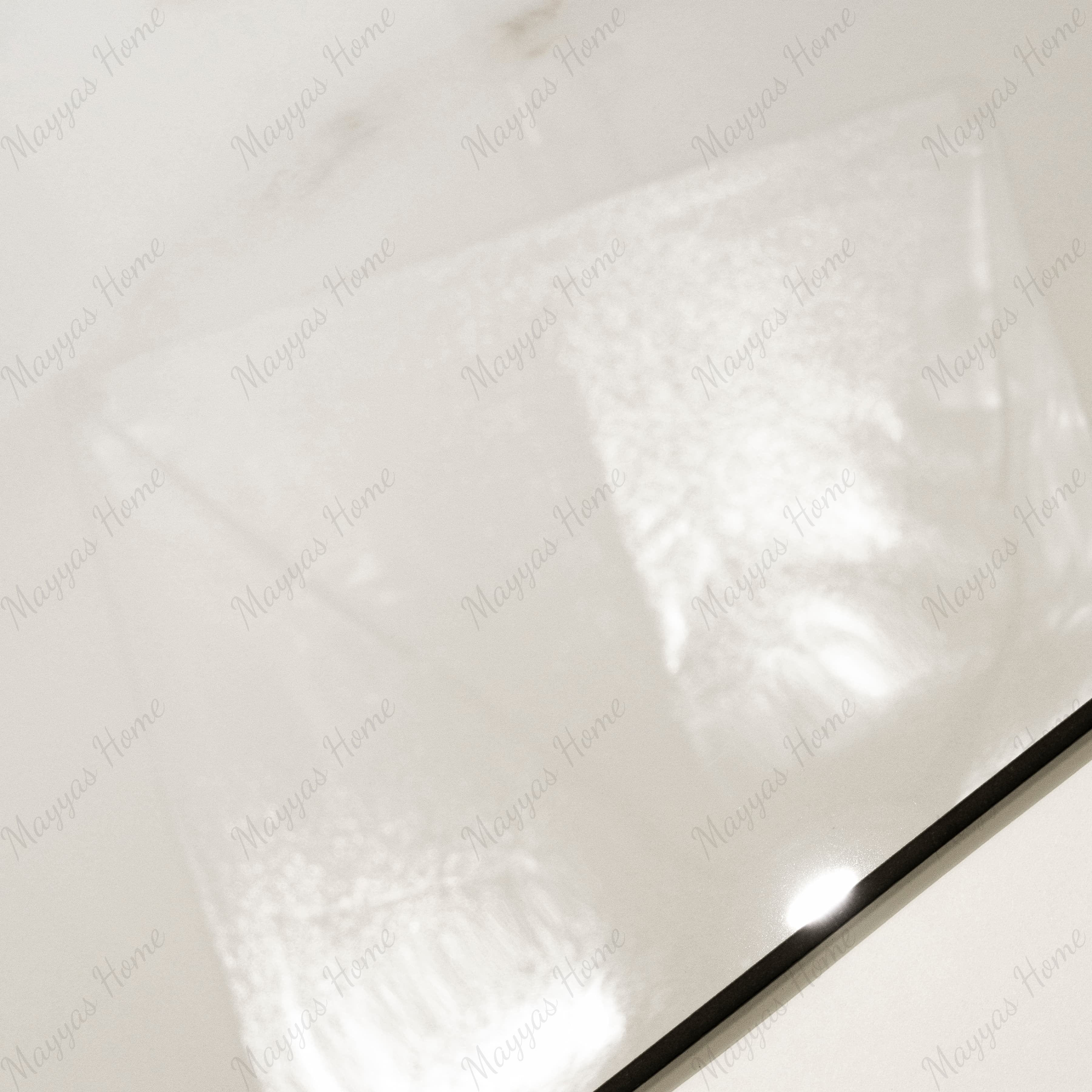 Close-up of Cecelia Gold glossy porcelain tile showing mirror-polished ivory marble surface with delicate golden vein detail and 9mm thickness