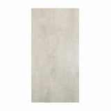 Element Arsenica Grey porcelain slab displayed on easel against luxury backdrop showing minimalist grey concrete-look surface for UAE interior design