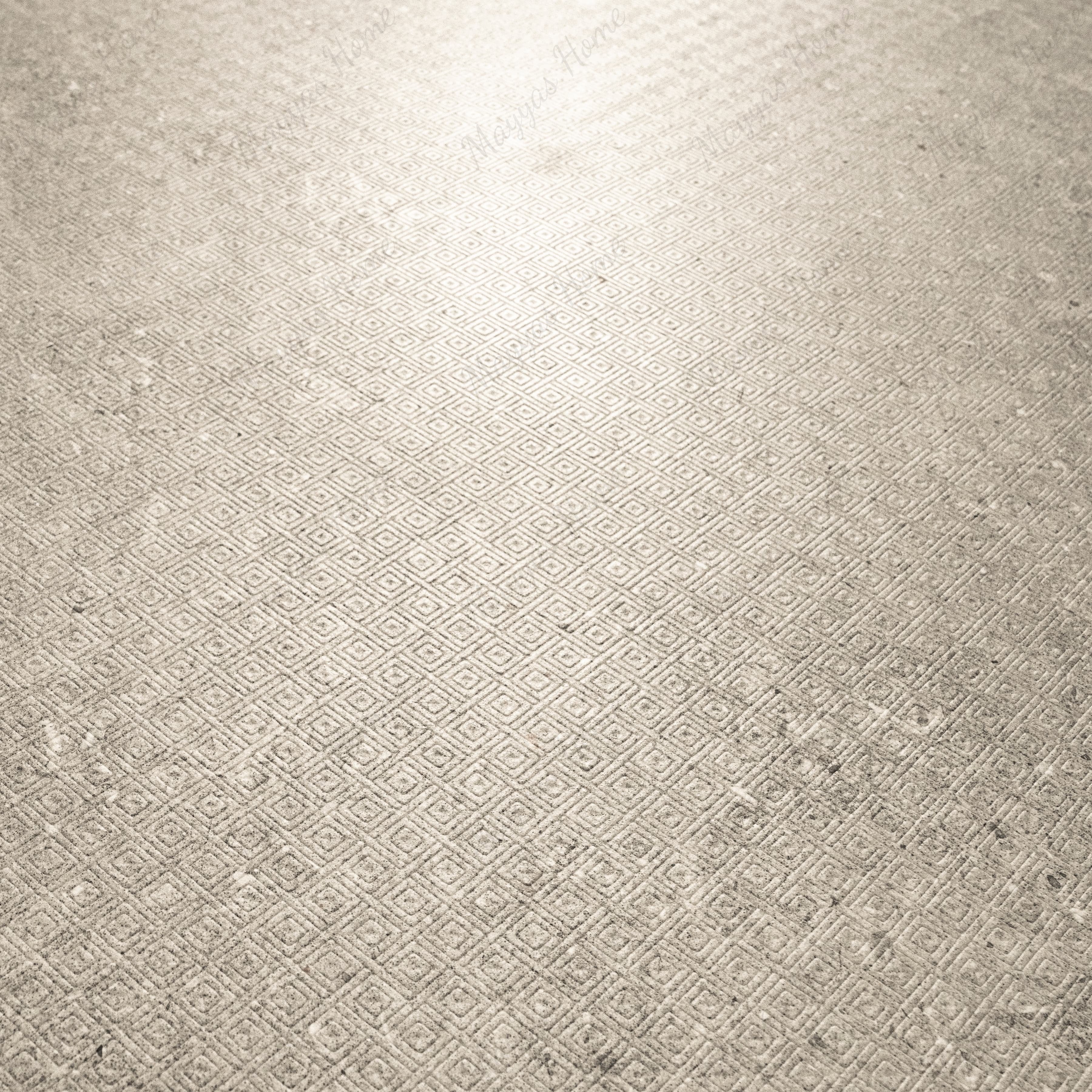 Close-up of Element Arsenica Grey porcelain slab showing refined grey surface with delicate mineral speckle and cool neutral undertones