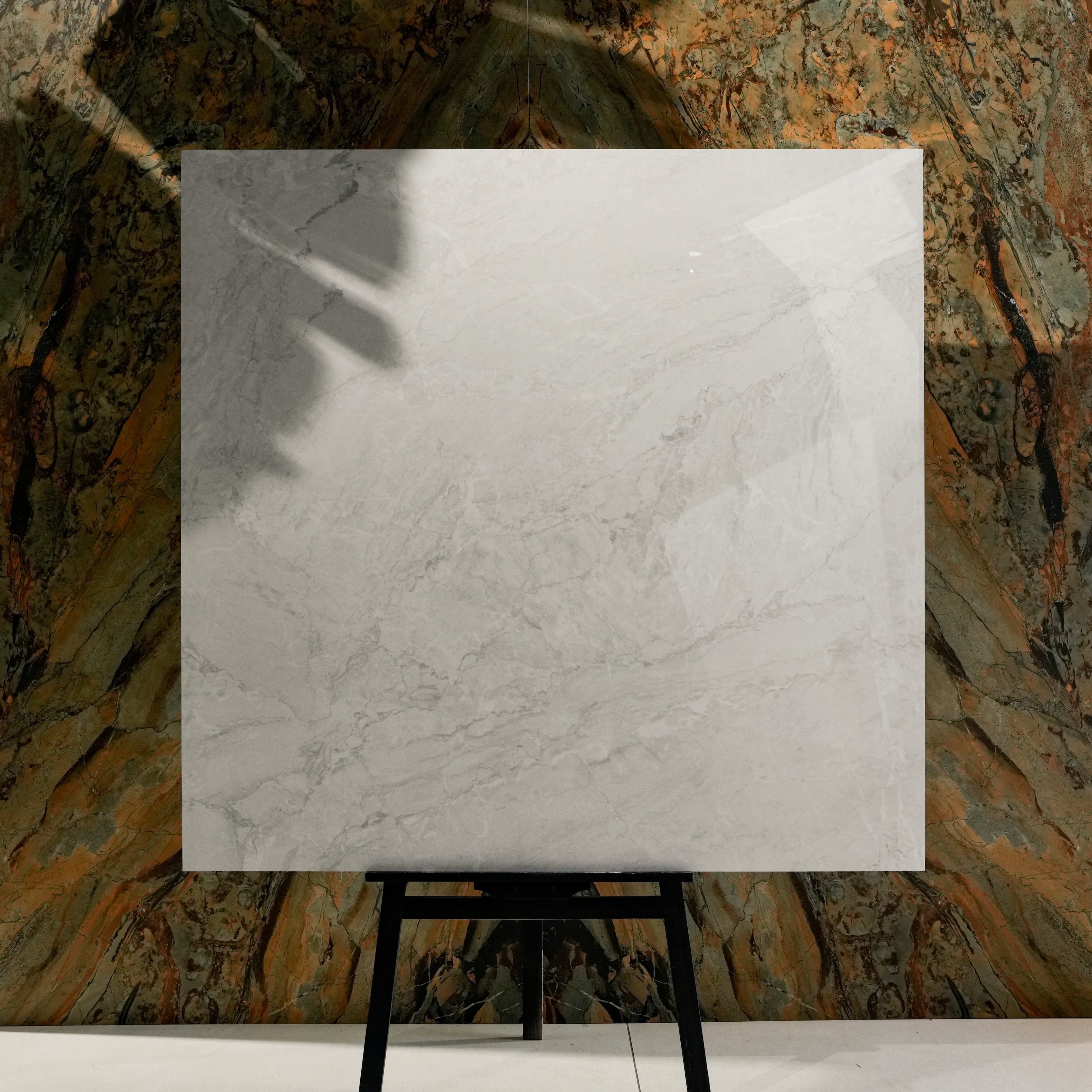 Silver Fume 120x120cm glossy porcelain tile flat view showing soft white marble surface with smoky grey veining and natural movement