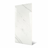 Statuario Platina BM large format porcelain slab angled view highlighting polished white marble finish, dramatic linear veining, and rectified edges