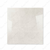 Pietra Bianco glossy porcelain tile 120x120cm displayed on easel against luxury marble backdrop for UAE interior design