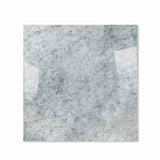 Celest Onyx glossy porcelain tile 120x120cm displayed on easel against luxury marble backdrop for UAE interior design