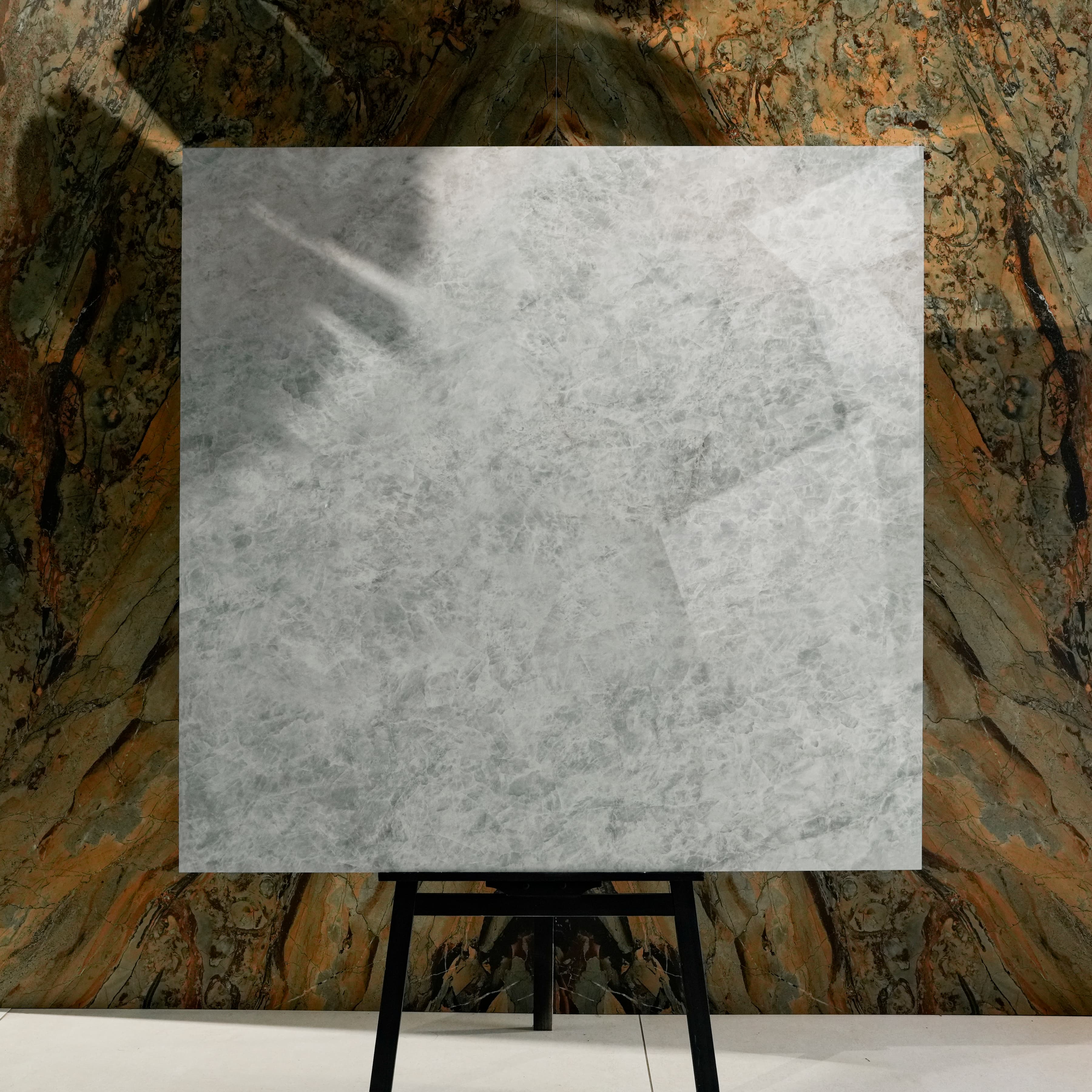 Celest Onyx 120x120cm glossy porcelain tile flat view showing icy blue-grey onyx surface with crystalline crackled texture