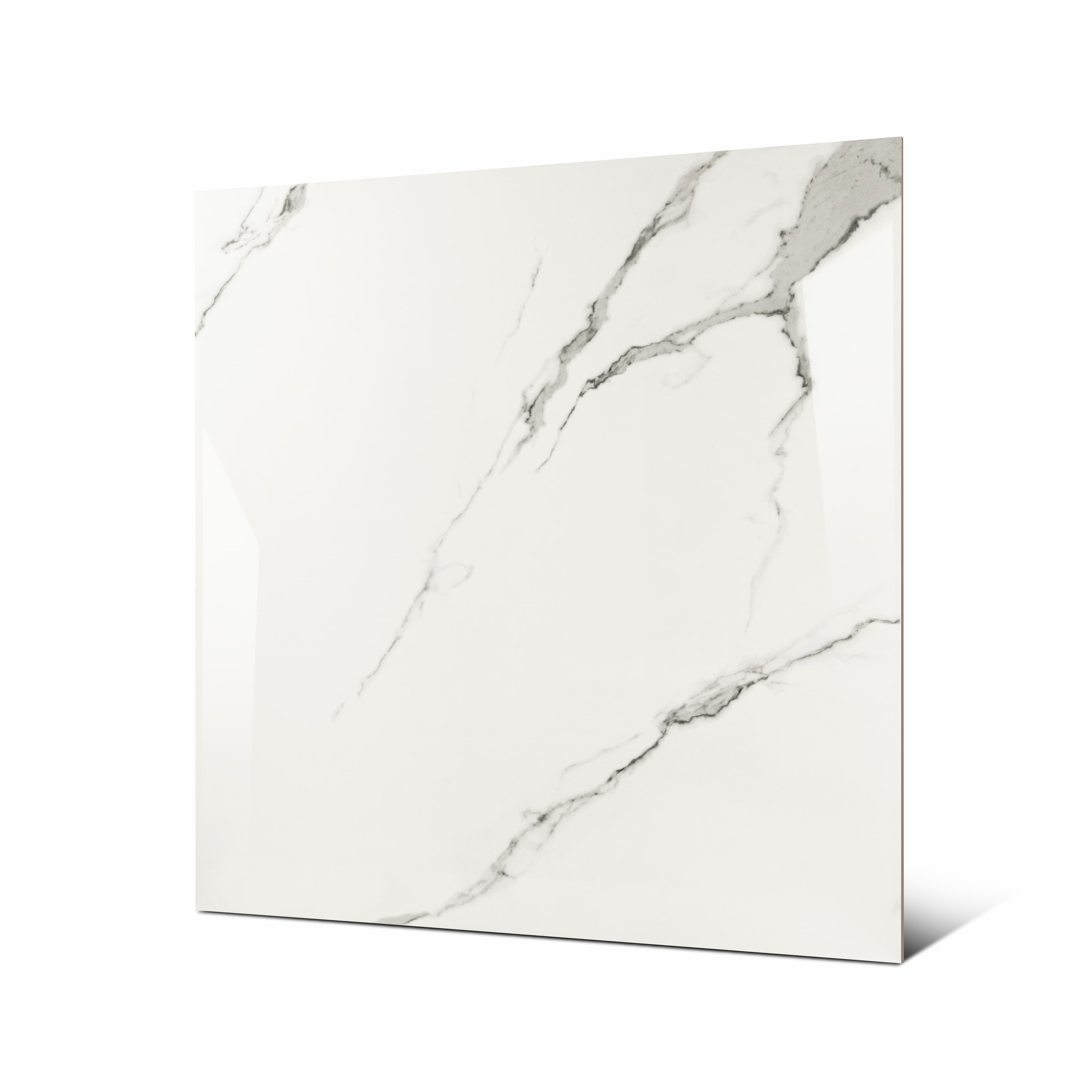 Statuario Hexa large format porcelain tile angled view highlighting polished statuario marble finish, refined veining, and rectified edges