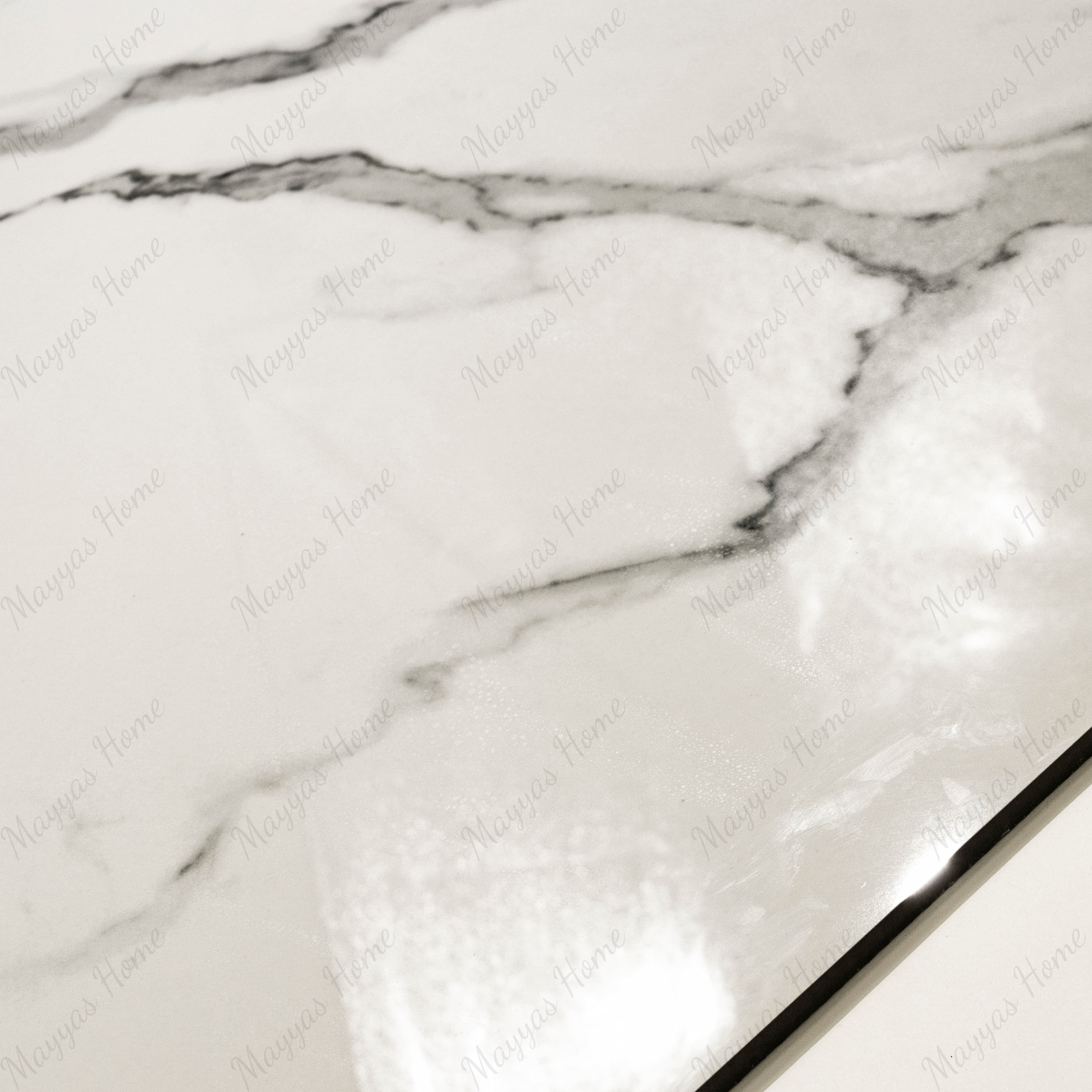 Close-up of Statuario Hexa glossy porcelain tile showing mirror-polished white marble surface with detailed grey vein detail and 9mm thickness