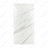 Gronza White BM porcelain slab displayed on easel against luxury backdrop showing bright white marble surface with elegant grey and gold veining for UAE interior design