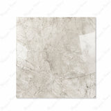 Breccia Bianco glossy porcelain tile 120x120cm displayed on easel against luxury marble backdrop for UAE interior design