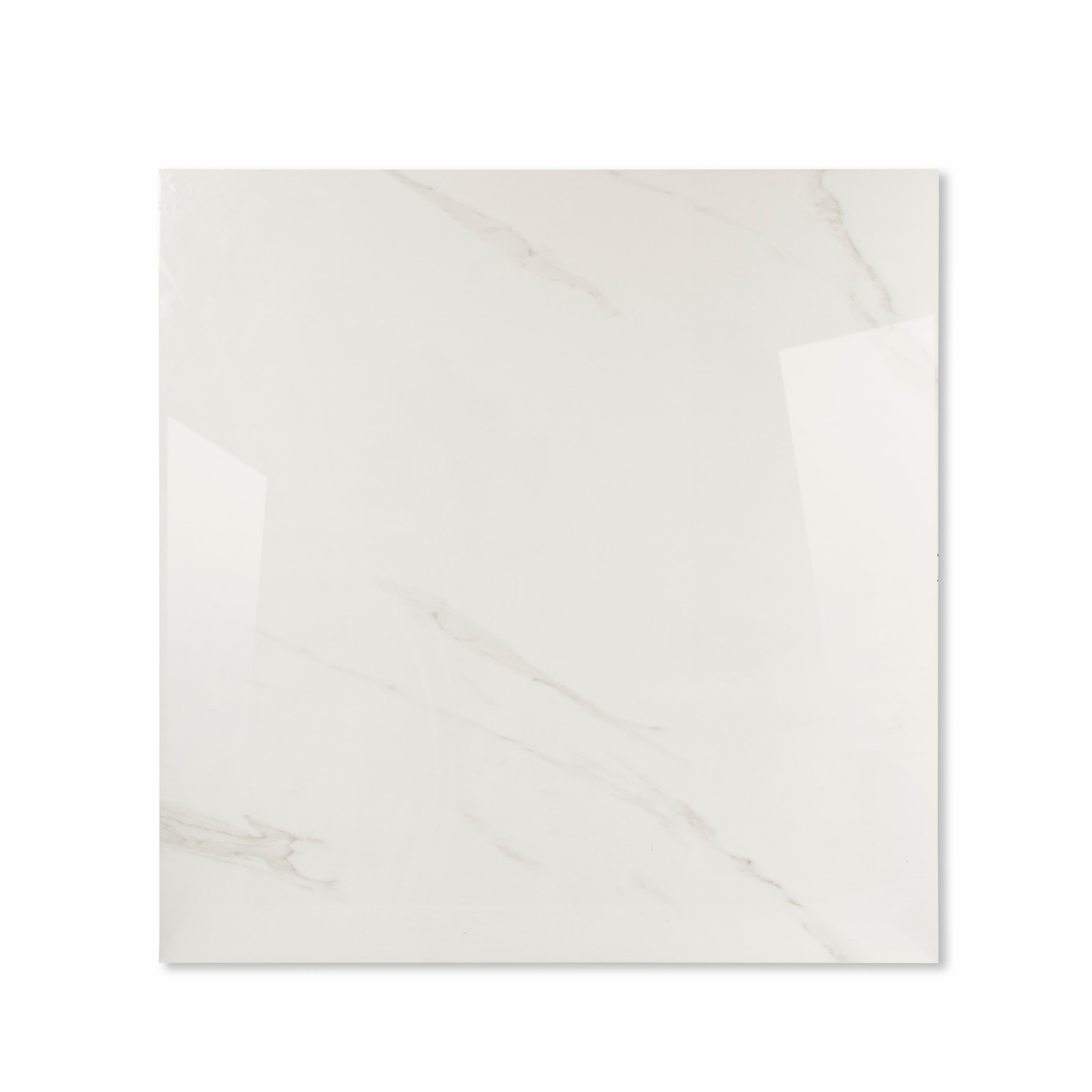 Smoke White glossy porcelain tile 120x120cm displayed on easel against luxury marble backdrop for UAE interior design