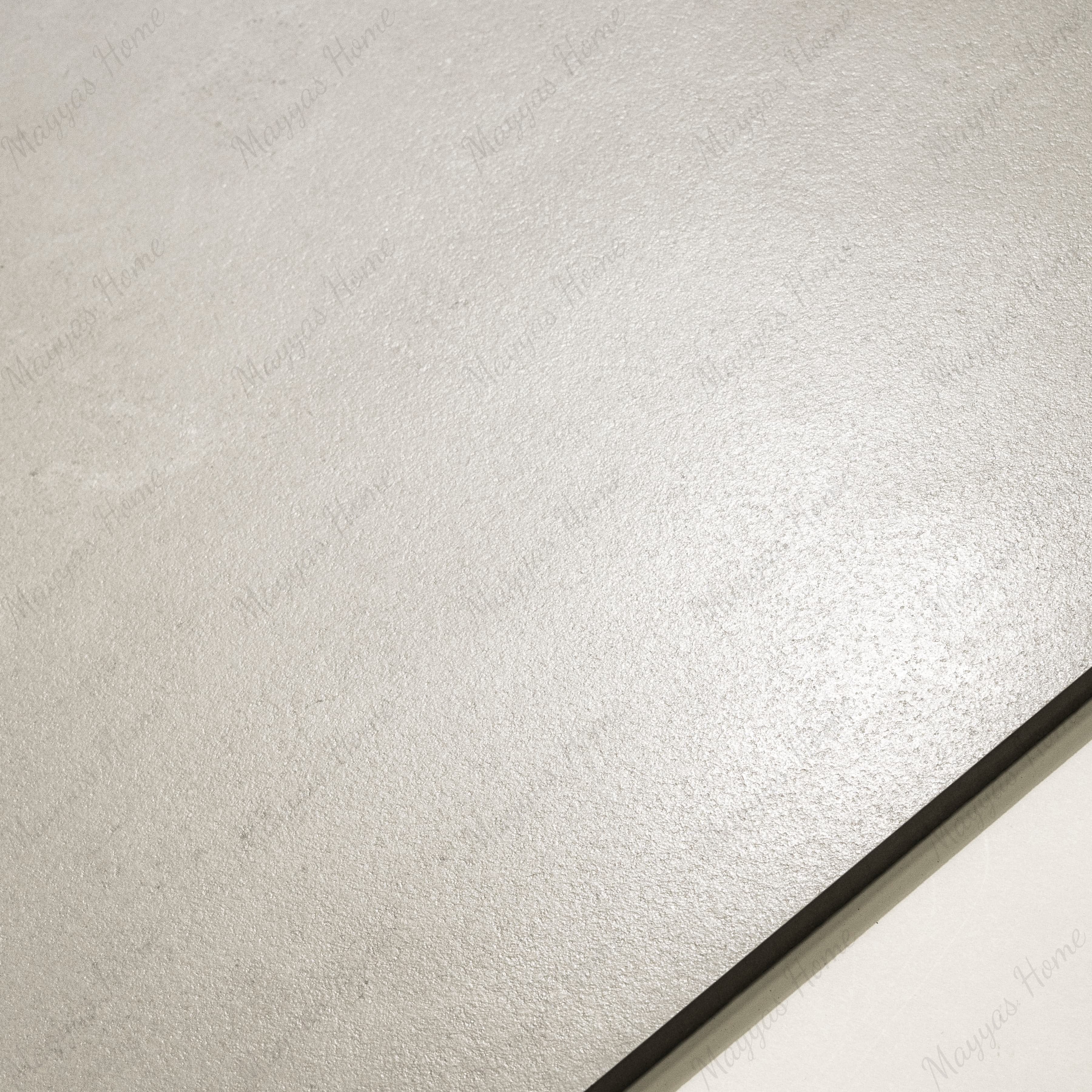 Close-up of Oslo Pearl matte porcelain tile showing fine natural stone texture, pearl-ivory tone, and 9mm thickness