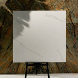 Smoke White 120x120cm matt porcelain tile with subtle grey veining. Durable, stylish, and perfect for modern floors and walls.