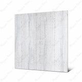 Stonex Grey large format porcelain tile angled view highlighting matte stone-terrazzo finish and rectified edges