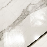 Close-up of Alps Natural glossy porcelain tile showing mirror-polished white marble surface with detailed grey vein clusters and 9mm thickness