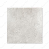 Resina Grey matte porcelain tile 120x120cm displayed on easel against luxury marble backdrop for UAE interior design
