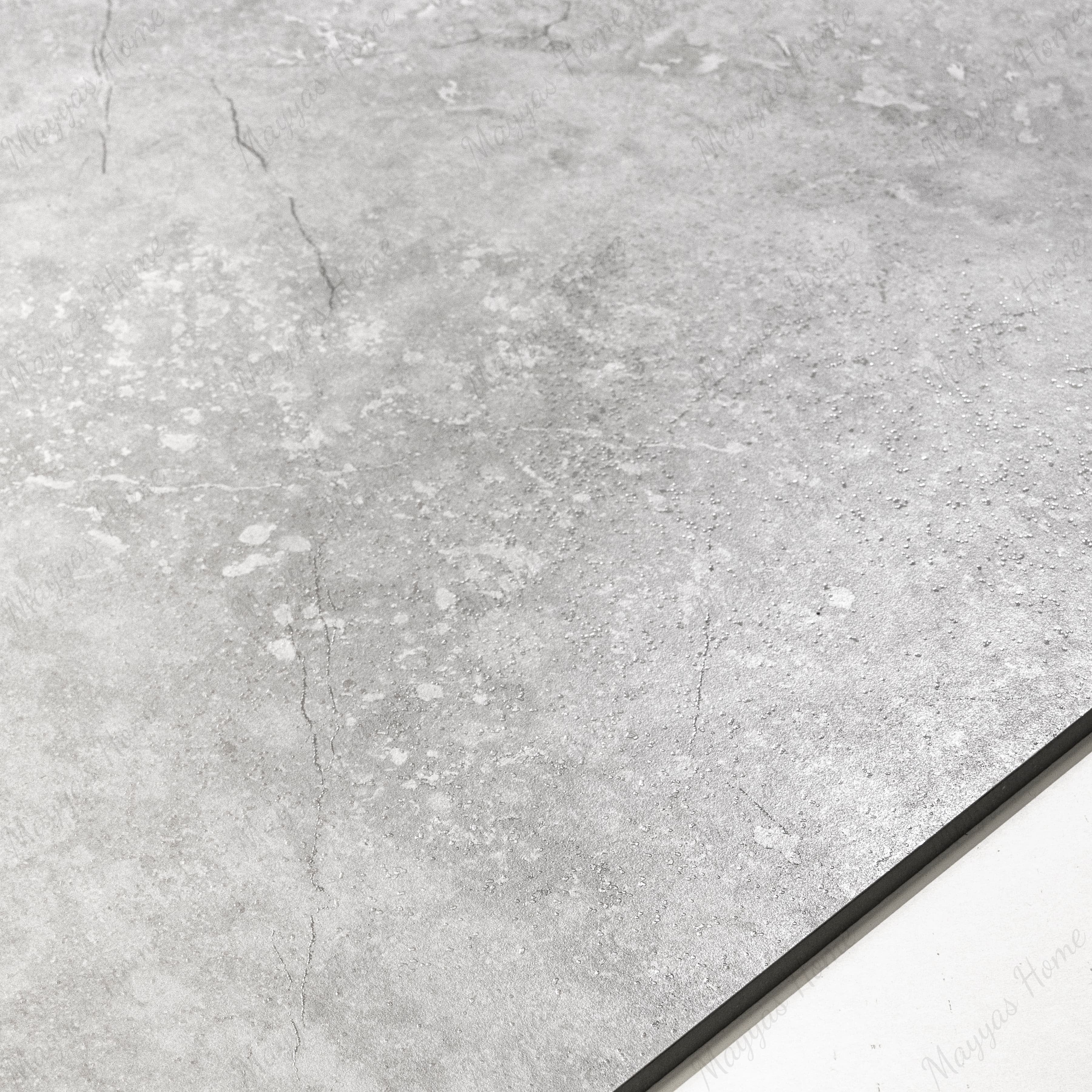 Resina Grey large format porcelain tile angled view highlighting matte stone finish, weathered marble effect, and rectified edges