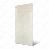 Bulgari Crema large format porcelain slab angled view highlighting smooth polished cream finish, subtle tonal variation, and rectified edges