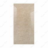 Cityscape Griege Endless porcelain slab displayed on easel against luxury backdrop showing warm greige marble with delicate white veining for UAE interior design