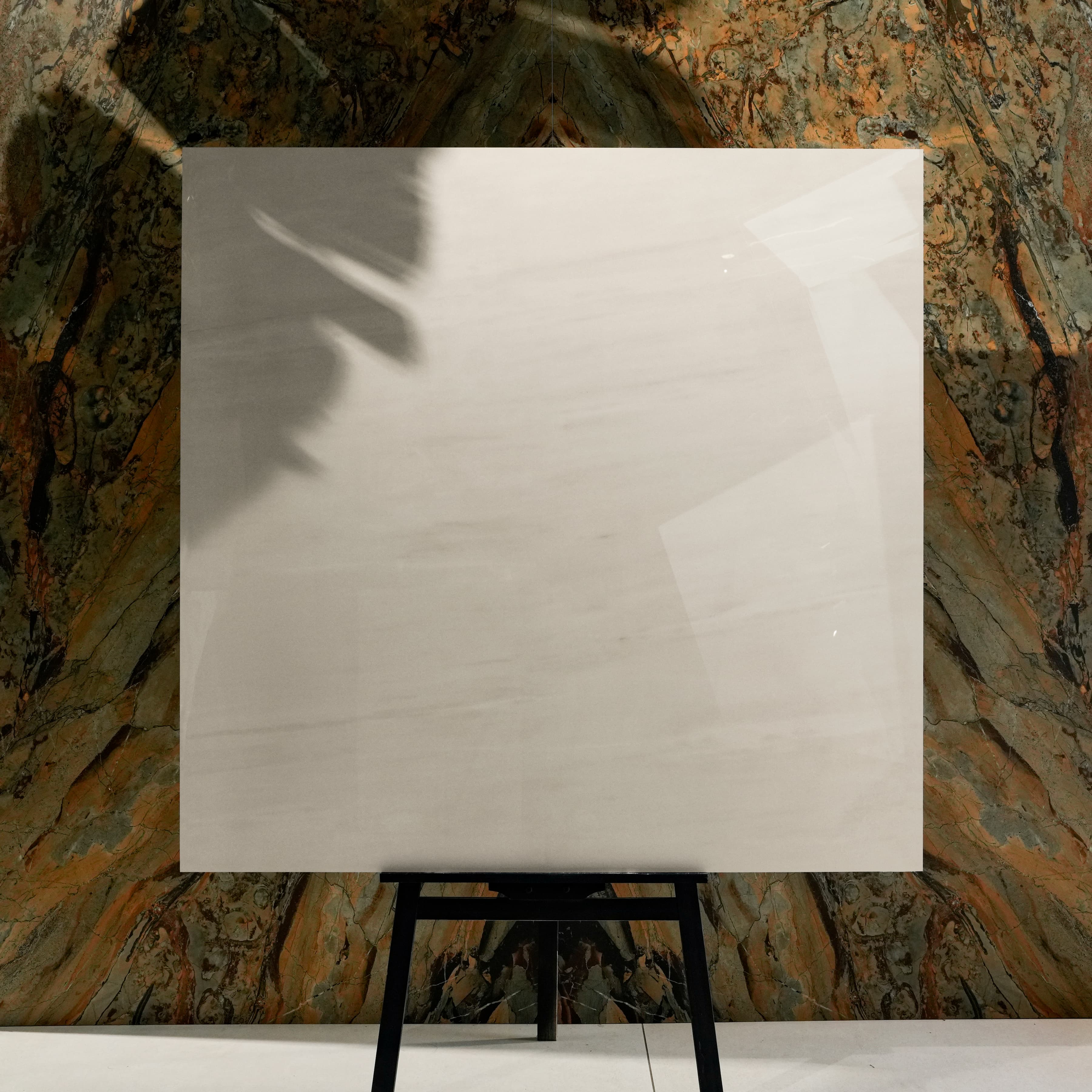 Melton Bianco 120x120cm glossy porcelain tile flat view showing soft white marble surface with delicate horizontal veining