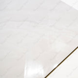 Artico Onyx Bianco glossy marble effect porcelain tile 60x120cm with 9mm thickness features white base, delicate veining, subtle onyx patterns & polished finish