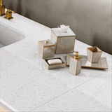 Brighten interiors with elegant stone look tiles featuring a sleek polished finish. Perfect for airy, modern spaces with large format tiles.
