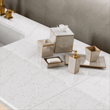 Brighten interiors with elegant stone look tiles featuring a sleek polished finish. Perfect for airy, modern spaces with large format tiles.