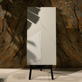 Calacatta Bianco glossy marble effect porcelain tile 60x120cm with 9mm thickness features bold veining and a refined polished finish for luxury spaces.