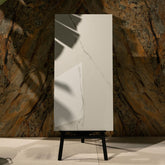 Calacatta Bianco glossy marble effect porcelain tile 60x120cm with 9mm thickness features bold veining and a refined polished finish for luxury spaces.