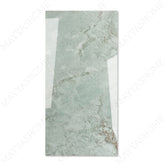 Calci Green glossy marble effect porcelain tile 60x120cm with 9mm thickness features rich green tones and a refined polished finish.