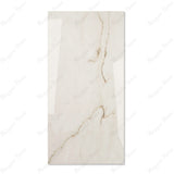 Calcutta Bianco Oro glossy marble porcelain tile 60x120cm with 9mm thickness features white base, gold and grey veining with polished finish.