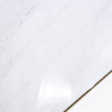 Celeste White glossy marble effect porcelain tile 60x120cm with 9mm thickness features bright white base, soft grey veins and polished finish.