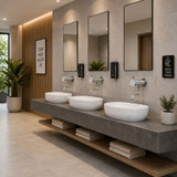 Commercial wall-mounted timed mixer tap with swivel spout, push-button activation, adjustable flow control and anti-vandal protection for UAE washrooms.