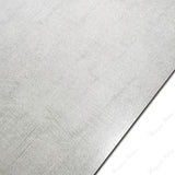 Concrete Bianco porcelain tile features a soft white cement look in 60x120cm size, offering durability, elegance, and easy maintenance for floors and walls.