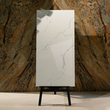 Eterna White glossy marble effect porcelain tile 60x120cm with 9mm thickness features bright white base, soft grey veins and polished finish.