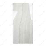 Explore the GLACIER WHITE large format porcelain tile, 60x120cm with a glossy marble-look finish. Durable 9MM porcelain tile ideal for floors and walls, offering elegance, easy installation, and lasting beauty.