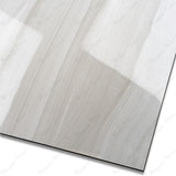 Explore the GLACIER WHITE large format porcelain tile, 60x120cm with a glossy marble-look finish. Durable 9MM porcelain tile ideal for floors and walls, offering elegance, easy installation, and lasting beauty.