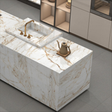 Figi Gold marble-look porcelain slab used for a luxury kitchen island and countertop