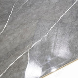 Graphite Vein glossy porcelain tile 60x120cm with 9mm thickness features dark graphite base, elegant veining and refined polished finish.