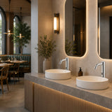 Luxury battery-powered electronic pre-mixed washbasin tap with extended body, above-counter installation and smart water-saving flow control.