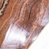 Mexican Onyx glossy onyx effect porcelain tile 60x120cm with 9mm thickness features warm amber tones and polished luxury finish.