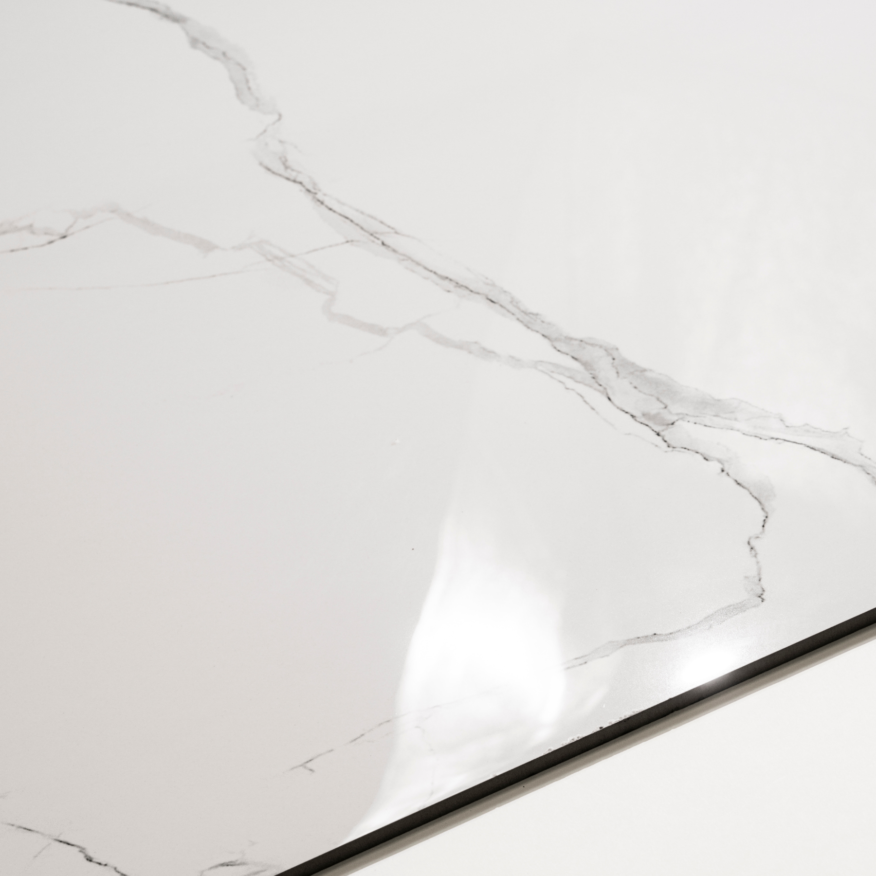 Mint Statuario 80x160cm glossy porcelain tile, 09mm thick with a mint-toned statuario marble design. Polished finish brings elegance and light to interiors.
