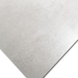 Pesero Smoky porcelain tile in 60x120cm size with modern stone effect, smoky grey tones and durable 9mm thickness for walls and floors.