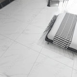 Shop STATUARIO ANGEL large format porcelain tiles (120x120cm) with a 9MM glossy finish and premium white marble effect. Durable, scratch-resistant, and easy to install. Perfect for luxurious interiors.