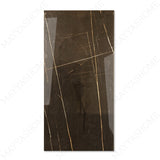 St Laurent glossy marble effect porcelain tile 60x120cm with 9mm thickness features black base with gold veining and polished finish.