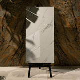 Statuario glossy marble effect porcelain tile 60x120cm with 9mm thickness features bold grey veining, polished shine, and a timeless luxury look for floors and walls.