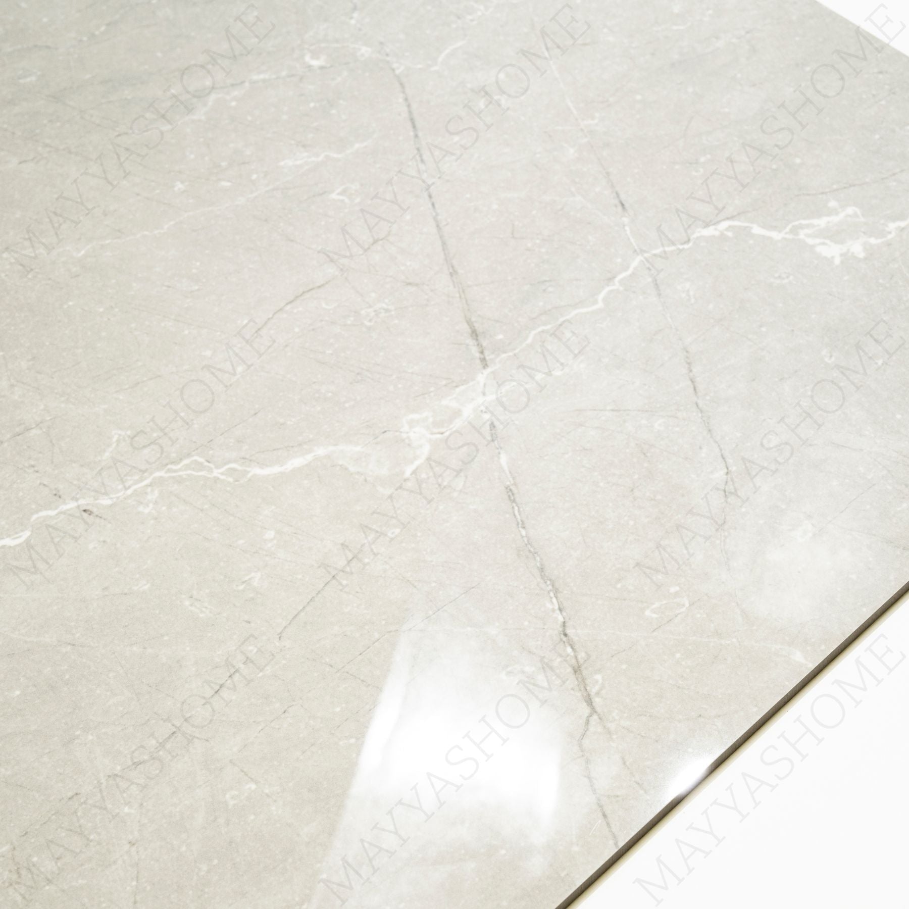 Toscana Grey glossy marble effect porcelain tile 60x120cm with 9mm thickness features soft grey tones, natural veining and polished finish.