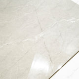 Toscana Grey glossy marble effect porcelain tile 60x120cm with 9mm thickness features soft grey tones, natural veining and polished finish.